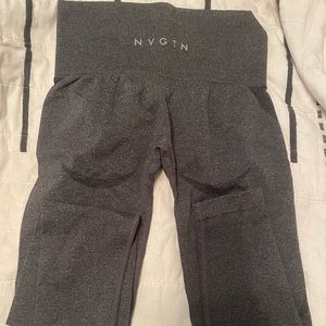 NEVER WORN NVGTN LEGGING- Size Small, detail under butt.